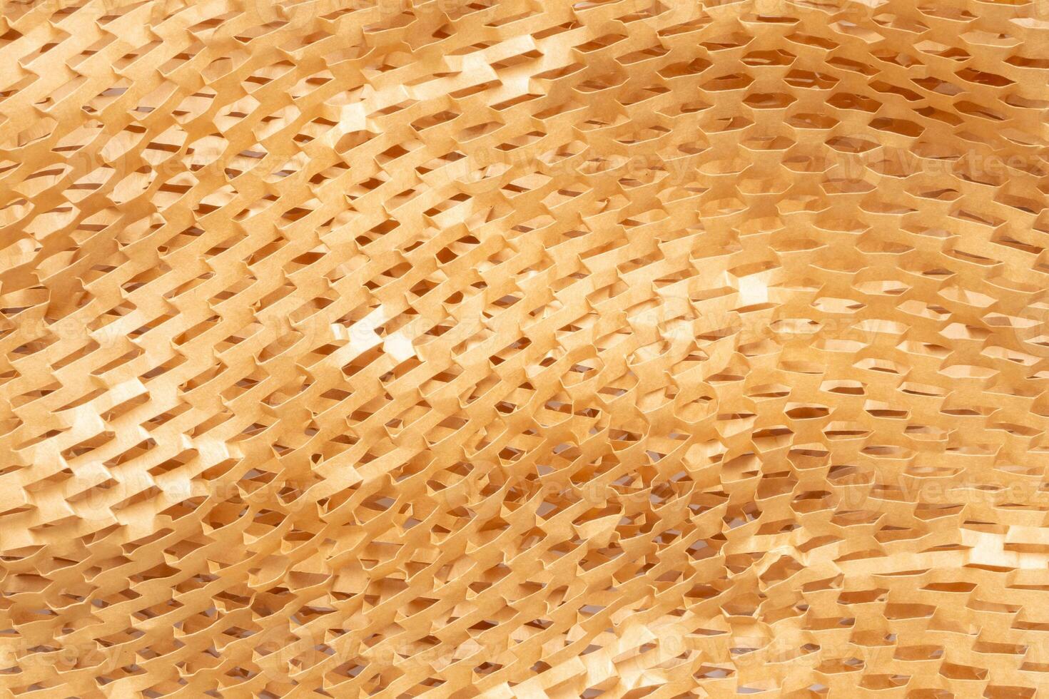 Eco friendly brown paper honeycomb texture wrap background for product packaging parcel carton box photo