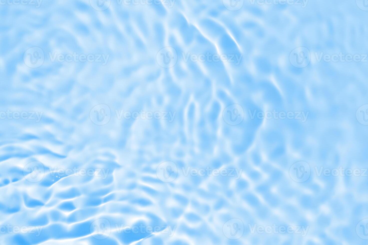 Abstract transparent water shadow surface texture natural ripple on blue background photo