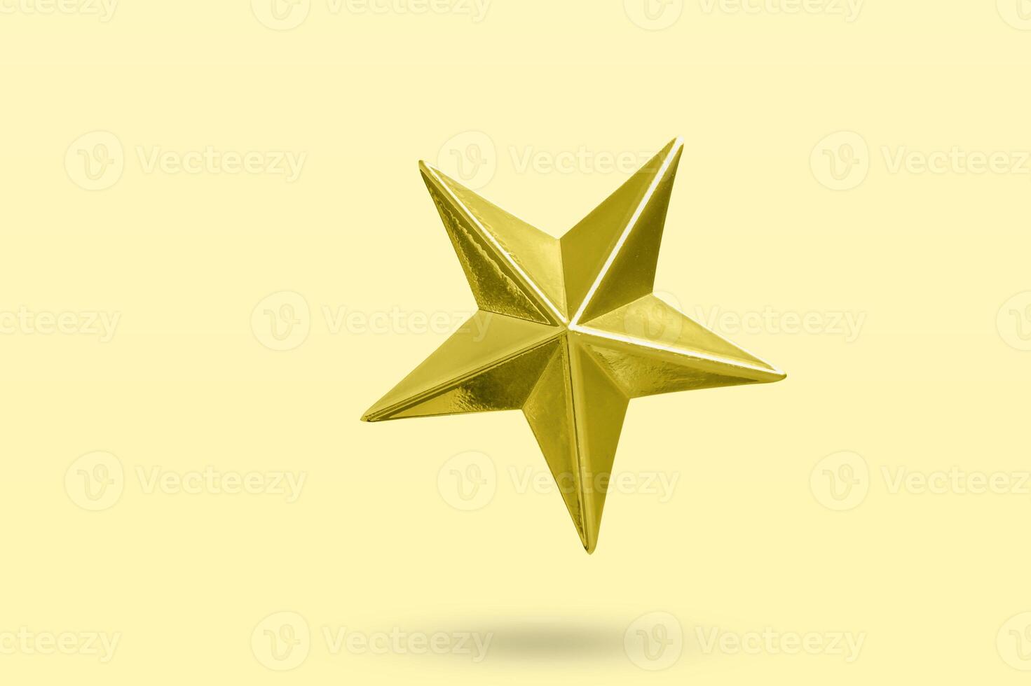 golden Christmas star jewels sticker isolated on yellow background photo