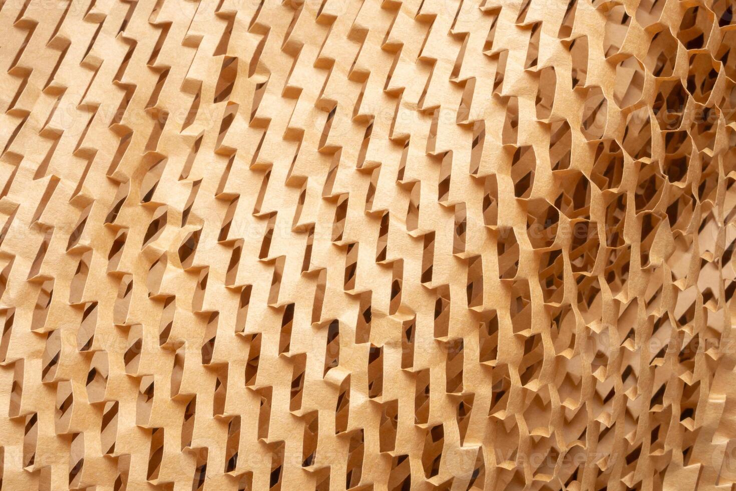 Eco friendly brown paper honeycomb texture wrap background for product packaging parcel carton box photo
