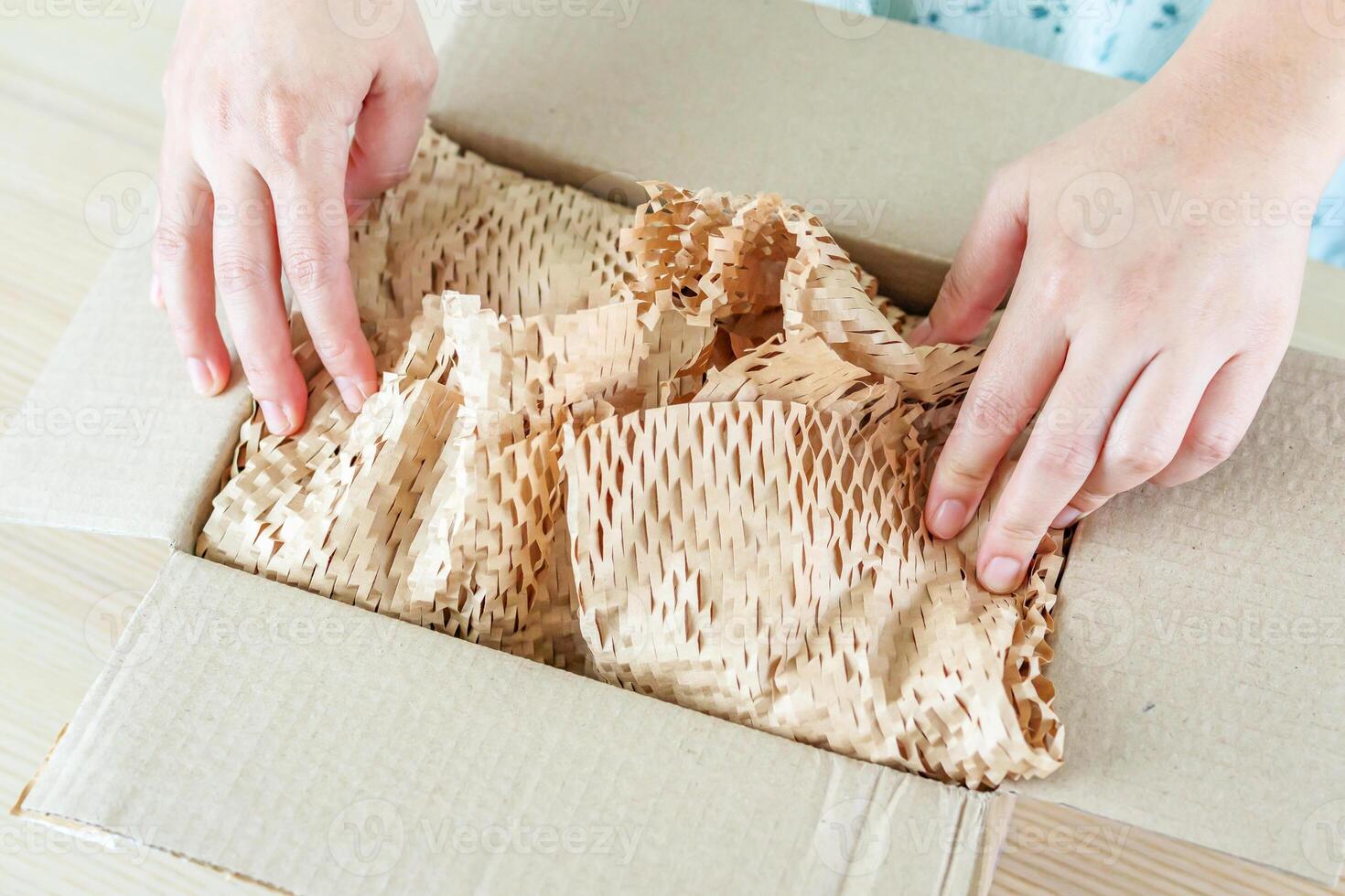Eco friendly brown paper honeycomb wrap for product packaging parcel carton box photo