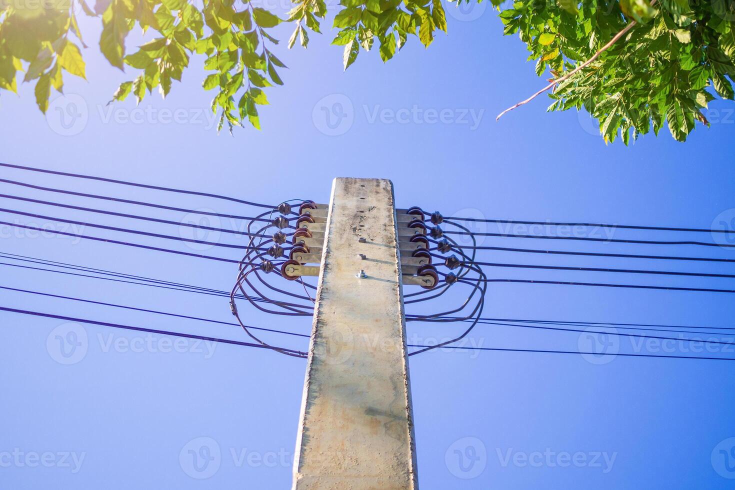 Electric power poles with power lines background photo