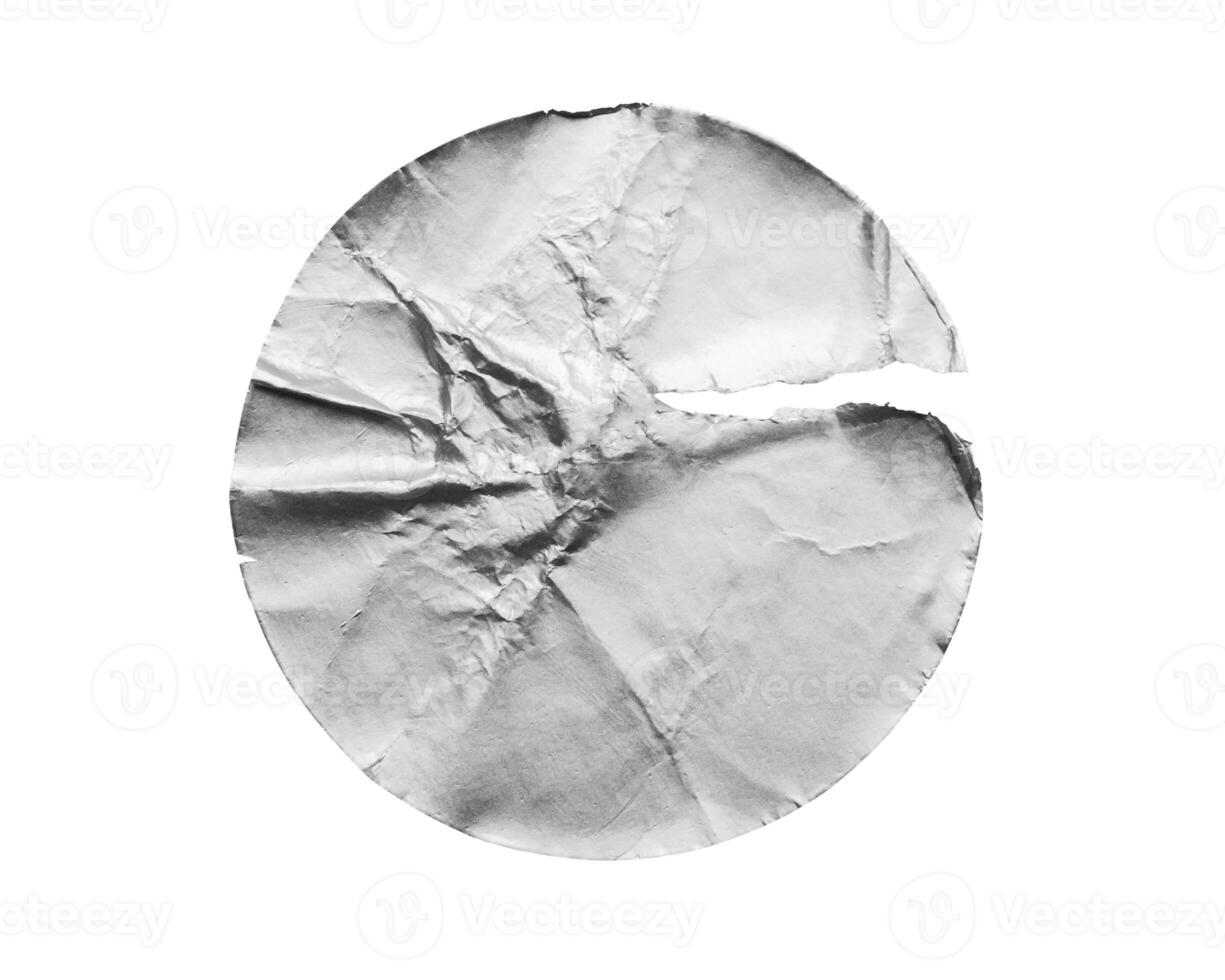 Blank silver round adhesive paper metallic sticker label isolated on white background photo
