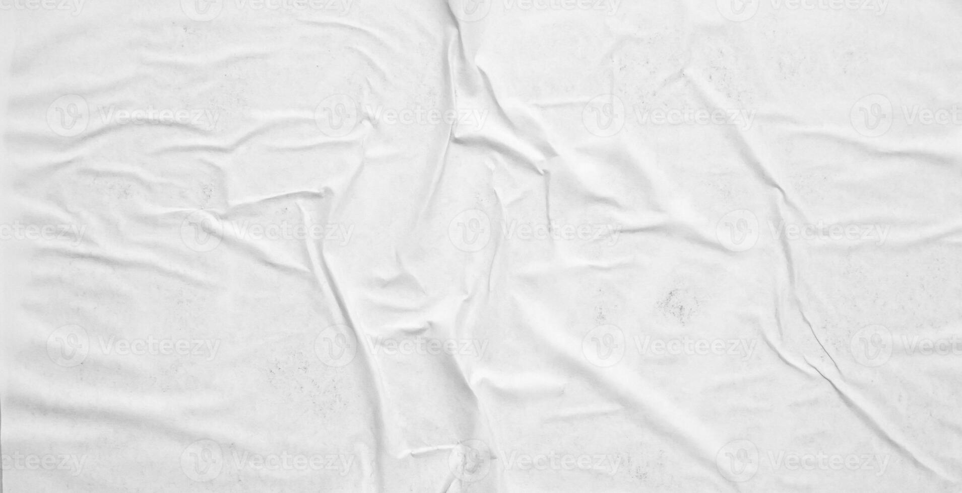 white crumpled and creased paper poster texture background photo