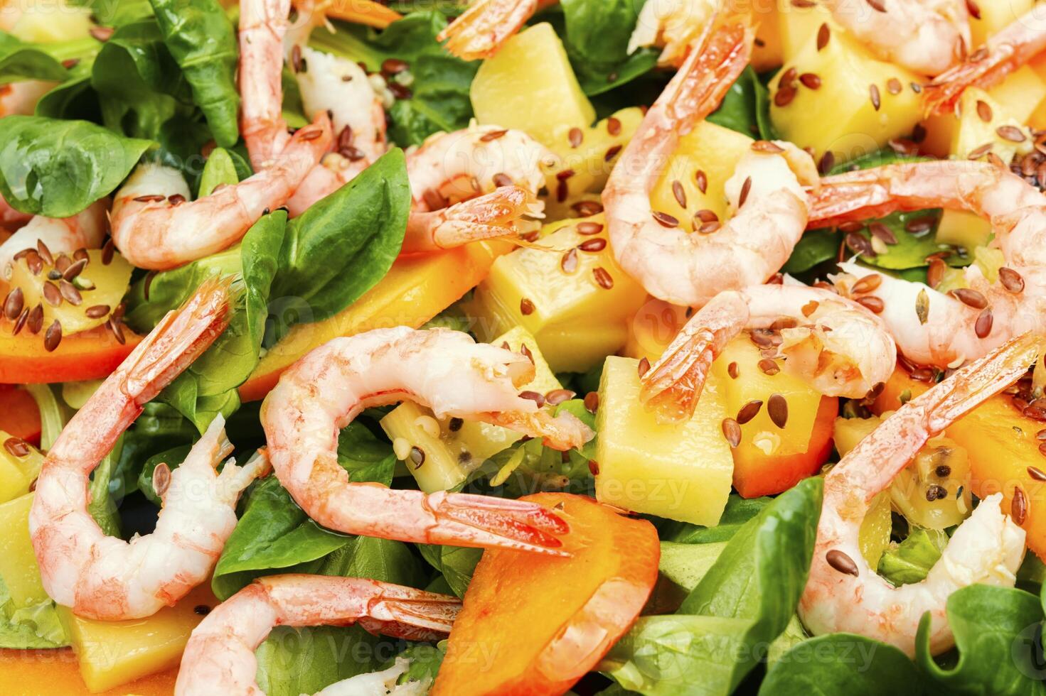 Fresh persimmon seafood salad. photo