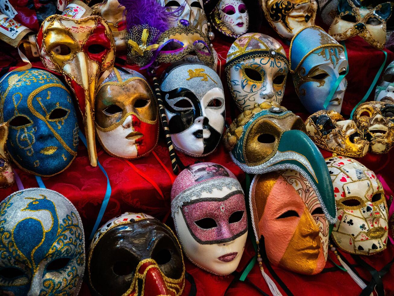 shop in italy numerous typical venetian masks with intricate decorations and details photo