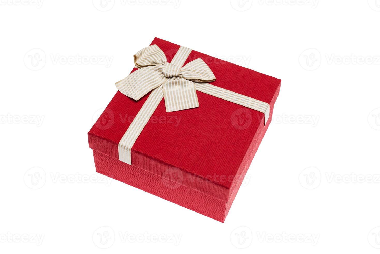 Red gift box with gold ribbon and bow isolated on white background photo