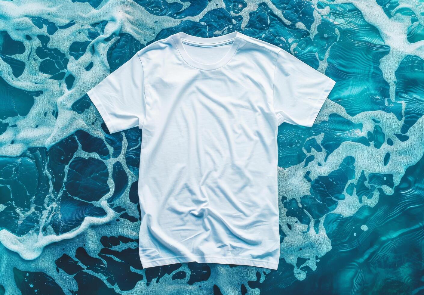 White t-shirt on water texture. Cotton tshirt in pool background. Mockup blank fashion design. Empty mock up cloth collection. Casual blank shirt textile photo
