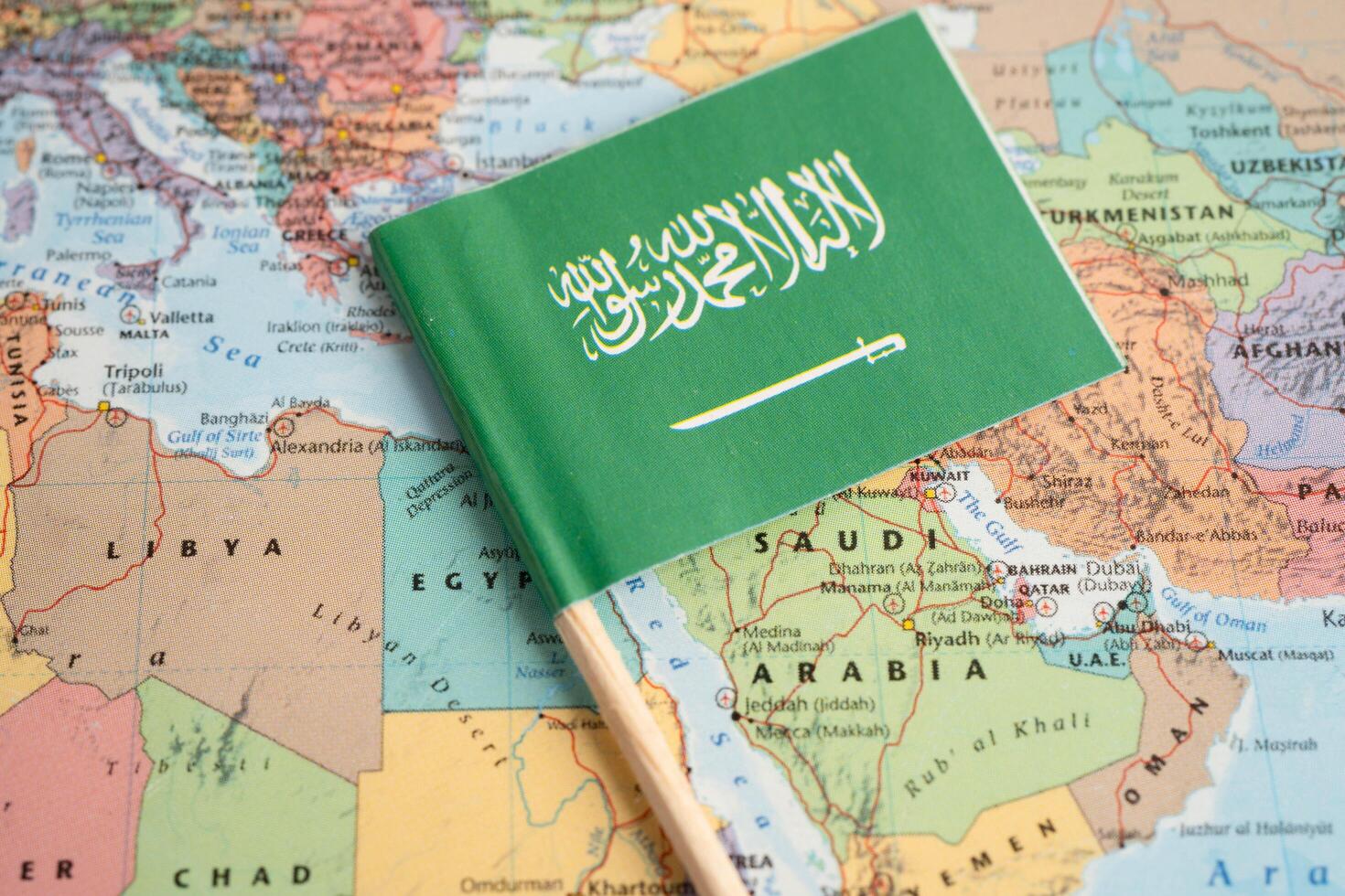 Bangkok, Thailand December 10, 2023 Saudi Arabia and Pakistan map in world map paper. photo