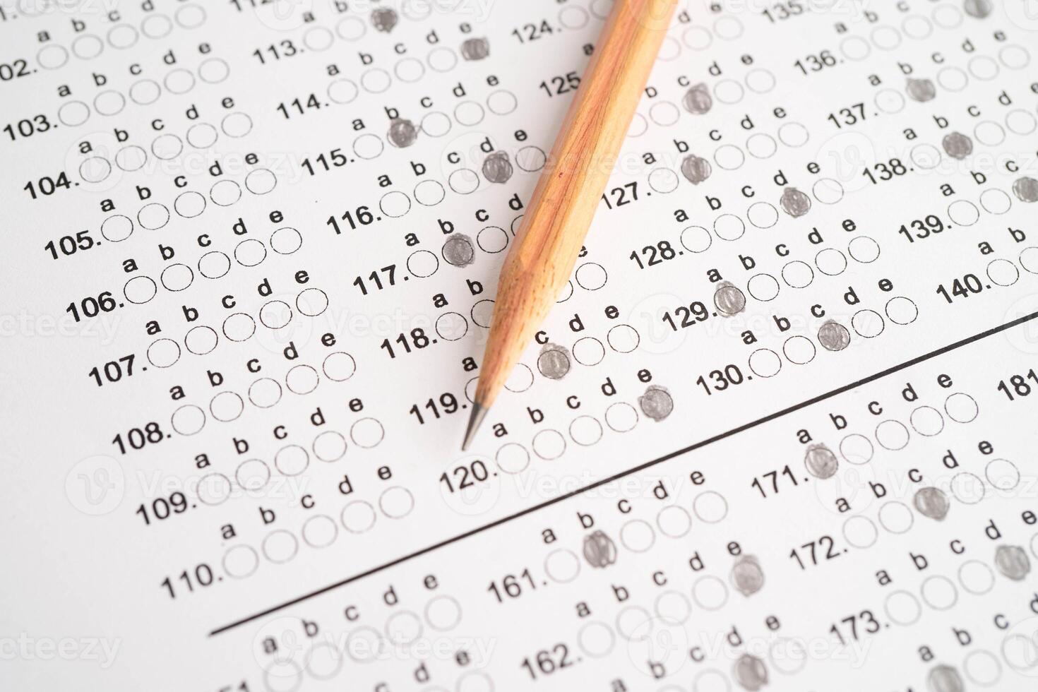 Answer sheets with pencil drawing fill to select choice, education. photo