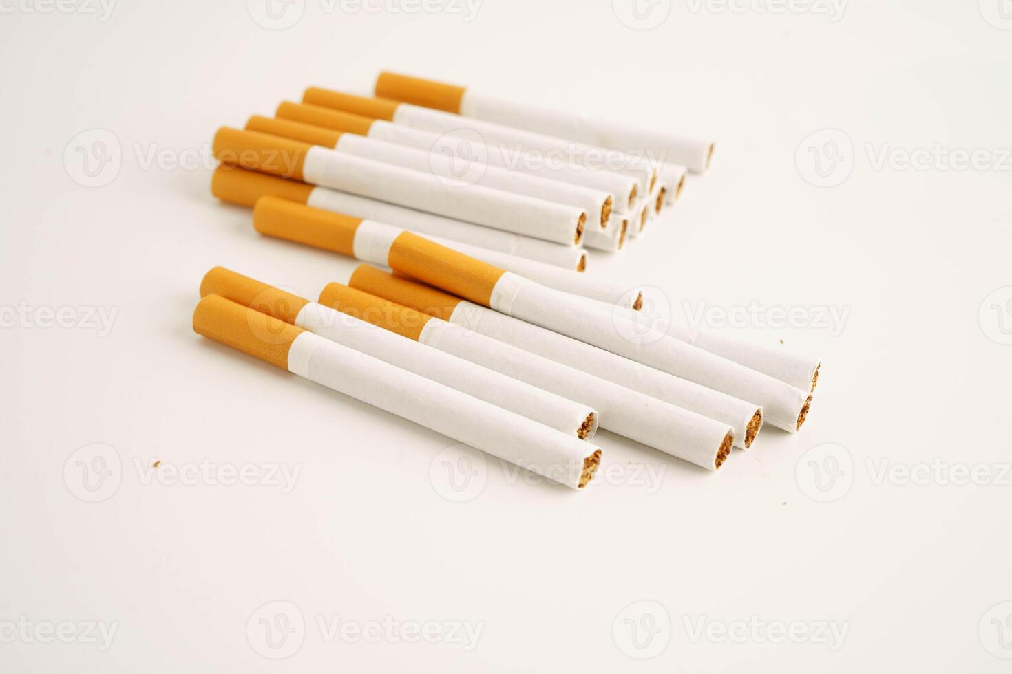 Cigarette, roll tobacco in paper with filter tube, No smoking. photo
