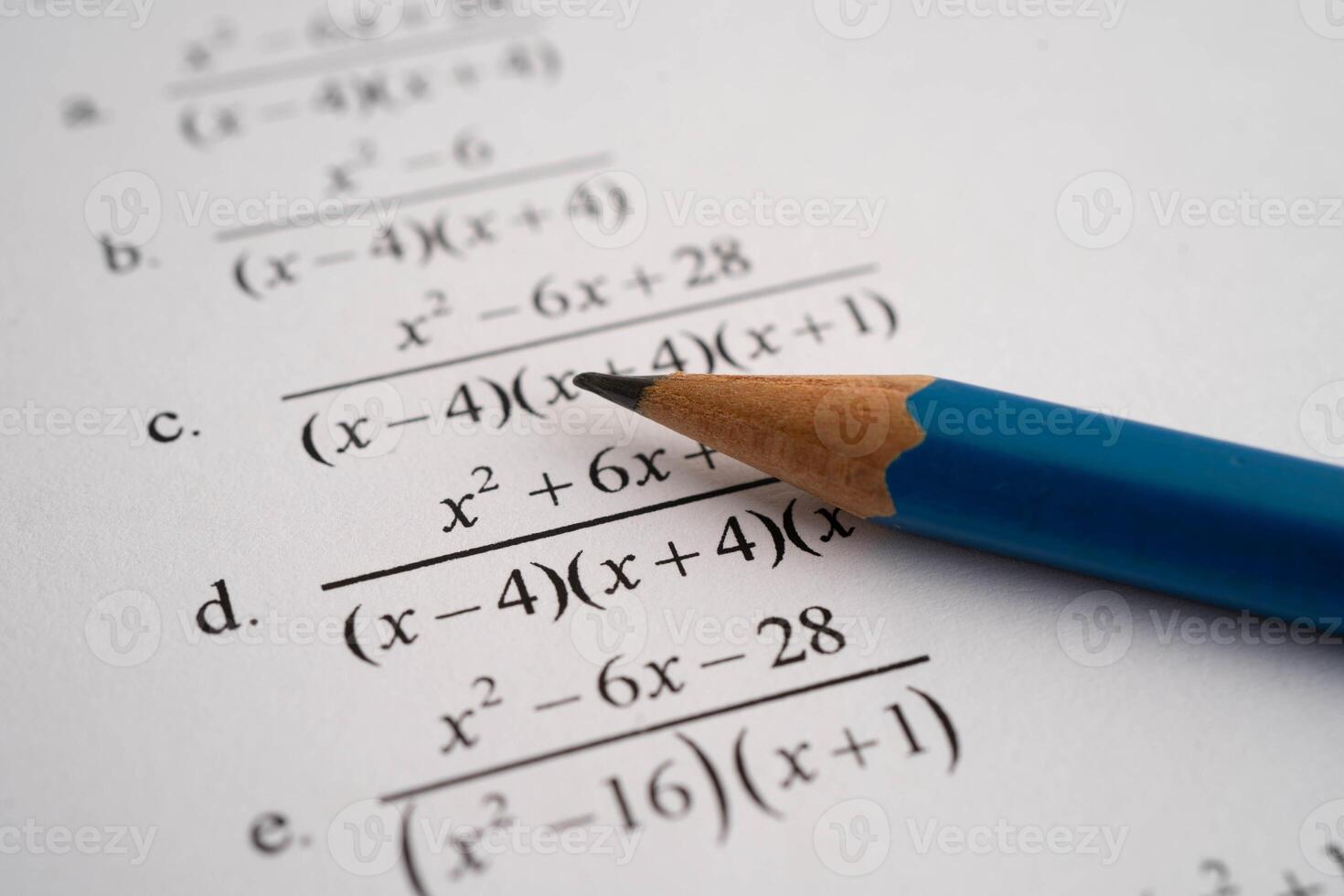 Pencil on mathematic formula exercise test paper in education school. photo