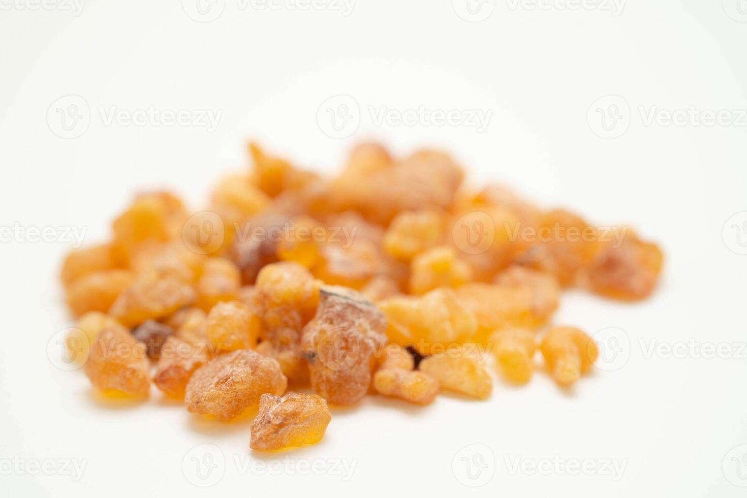 Frankincense or olibanum aromatic resin isolated on white background used in incense and perfumes. photo