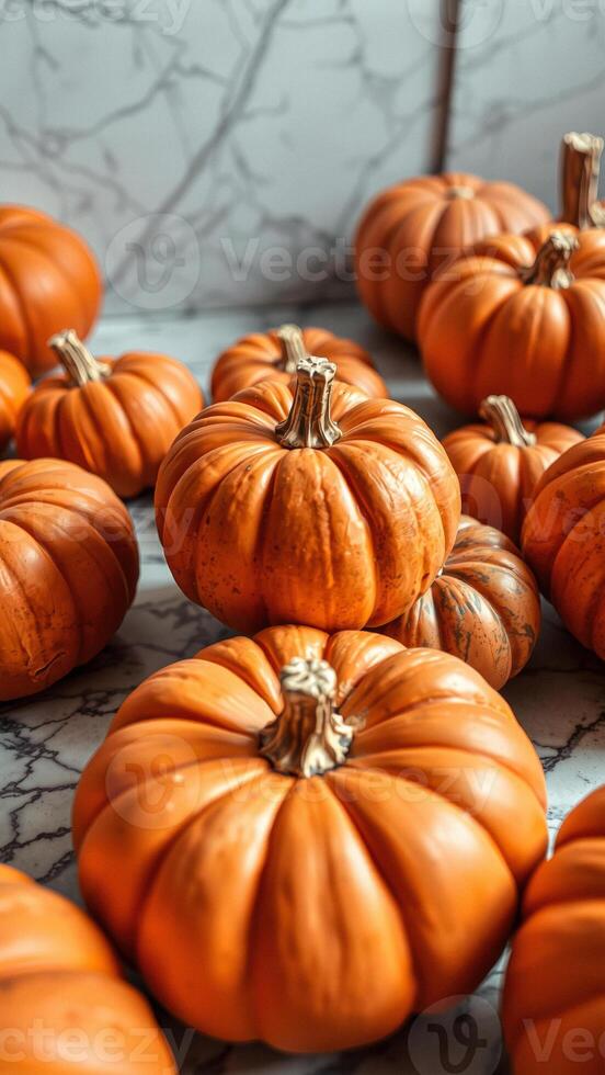 Close Up of Pumpkins on a Marble Surface photo