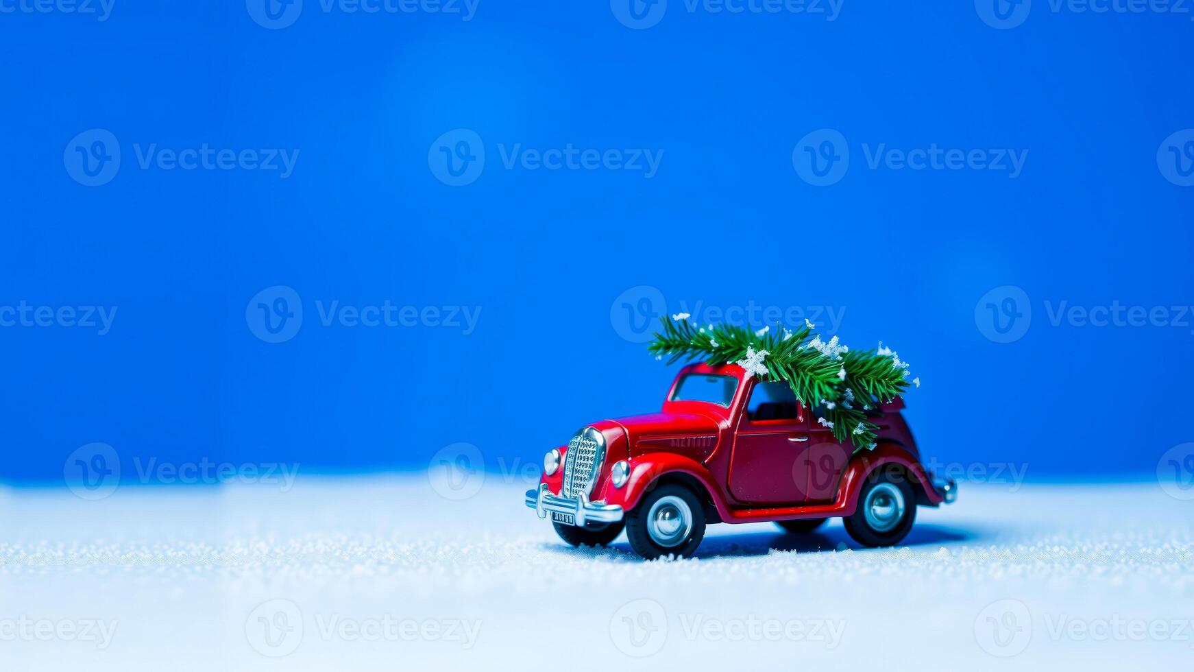 Red Toy Car With Christmas Tree On Top photo