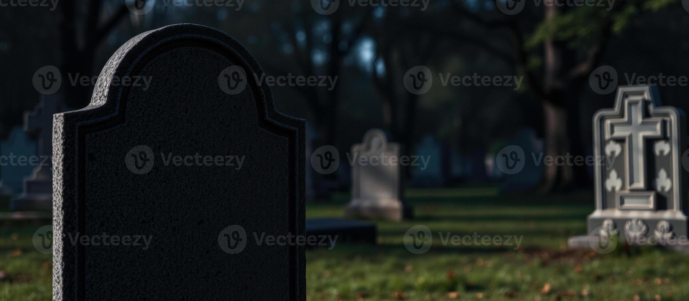 A blank headstone in a cemetery photo