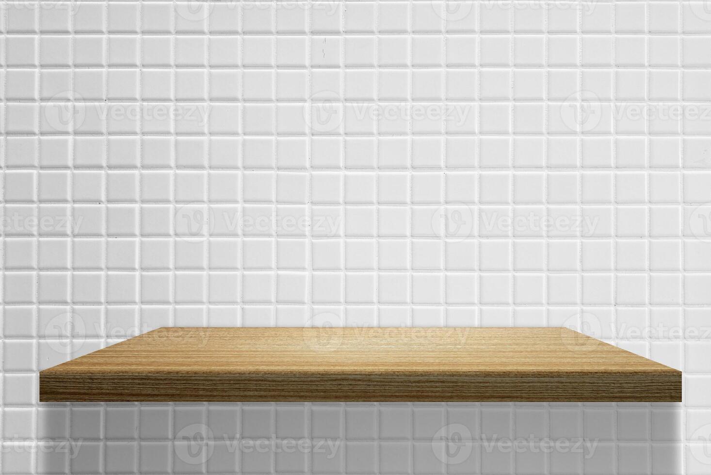 Wooden Shelf over White Marble Wall Background photo