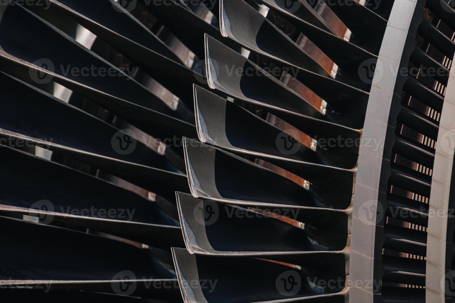 Turbine Blades, High Precision Engineering. Large Fan Stack Layer Metal Part Rotor In Jet Engine Or Steam Power Plant. photo