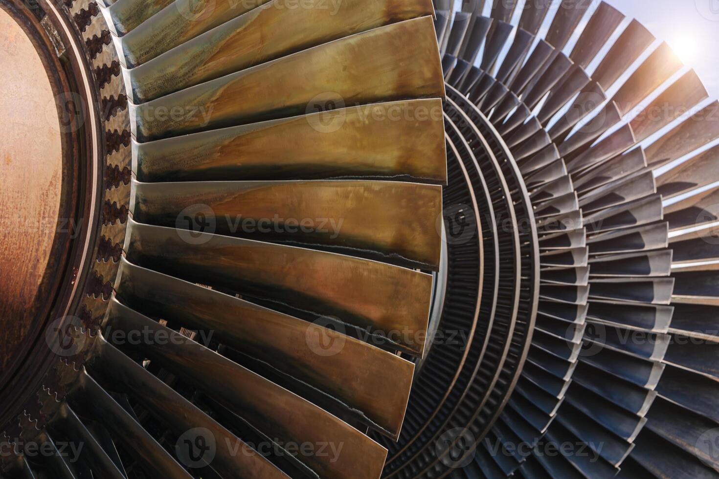 Turbine Blades, High Precision Engineering. Large Fan Stack Layer Metal Part Rotor In Jet Engine Or Steam Power Plant. photo