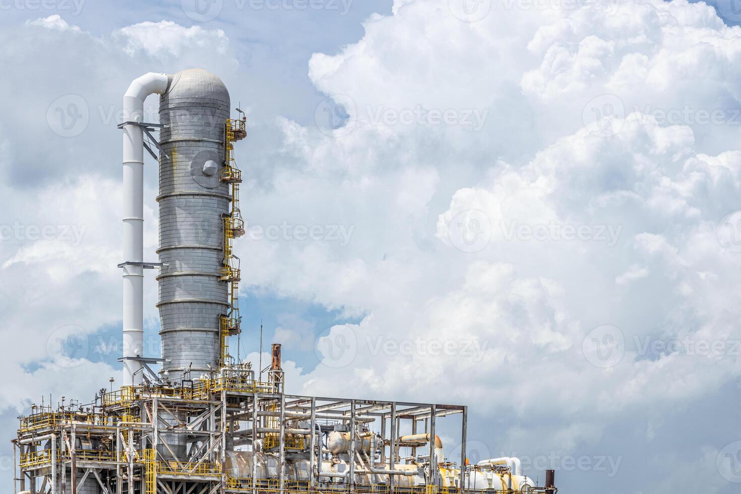 Oil petroleum refinery plant building distillation columns tower, Closeup part of fuel gas pipe complex, Crude oil petrochemical industrial building. photo
