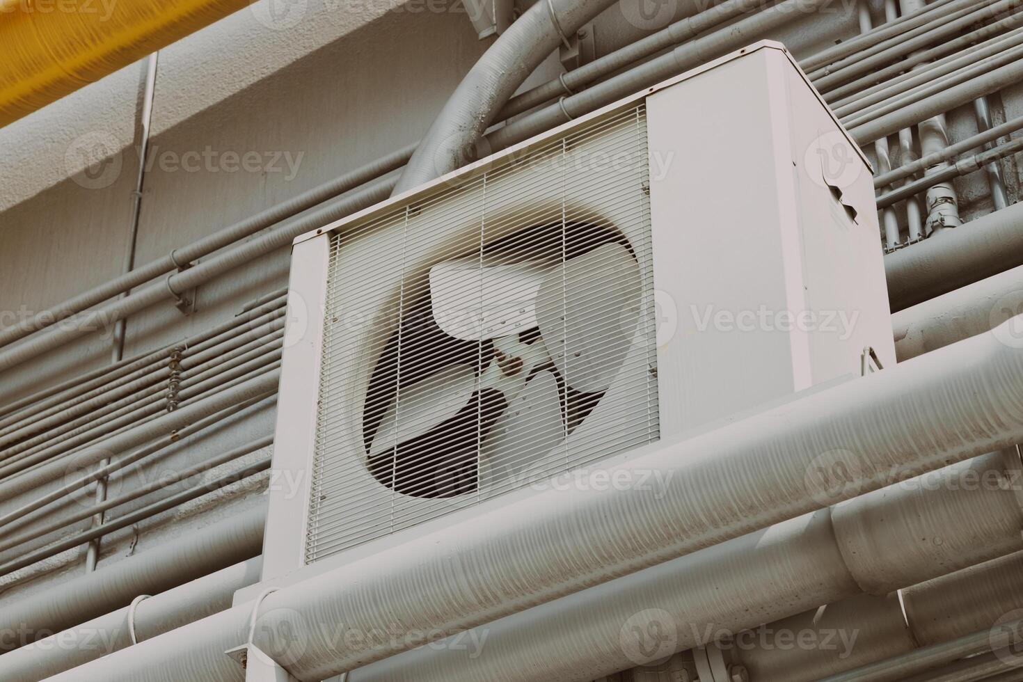 Air conditioner outdoor unit unit office building cooling system with pipeline. photo