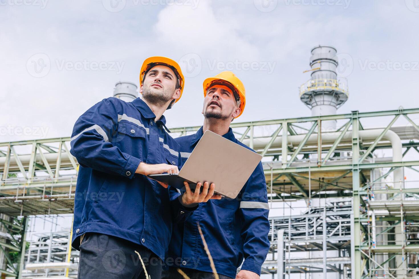 Engineer worker team working outdoor, Surveyor teamwork survey gas pipe oil transport pipeline deploy building project for refinery industry. photo