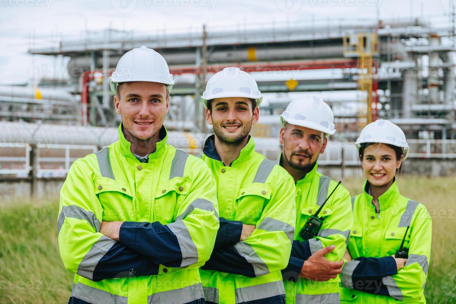 Group of oil and gas refinery engineer people worker standing happy smile, Smart expert teamwork together in petroleum industry. photo