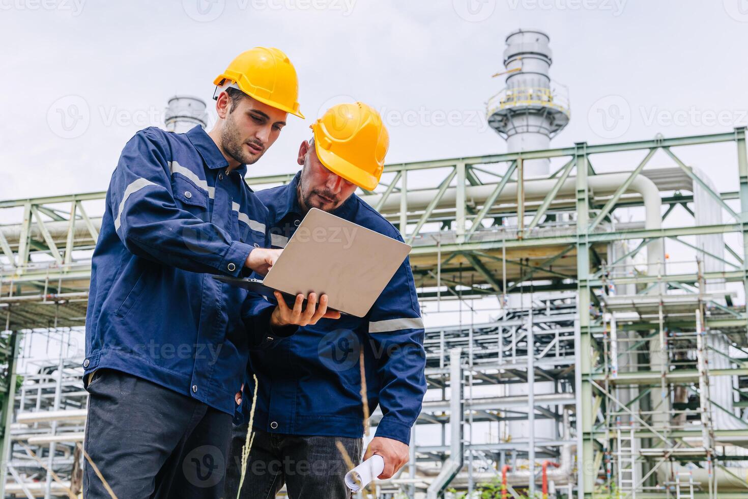 Engineer worker team working outdoor, Surveyor teamwork survey gas pipe oil transport pipeline deploy building project for refinery industry. photo