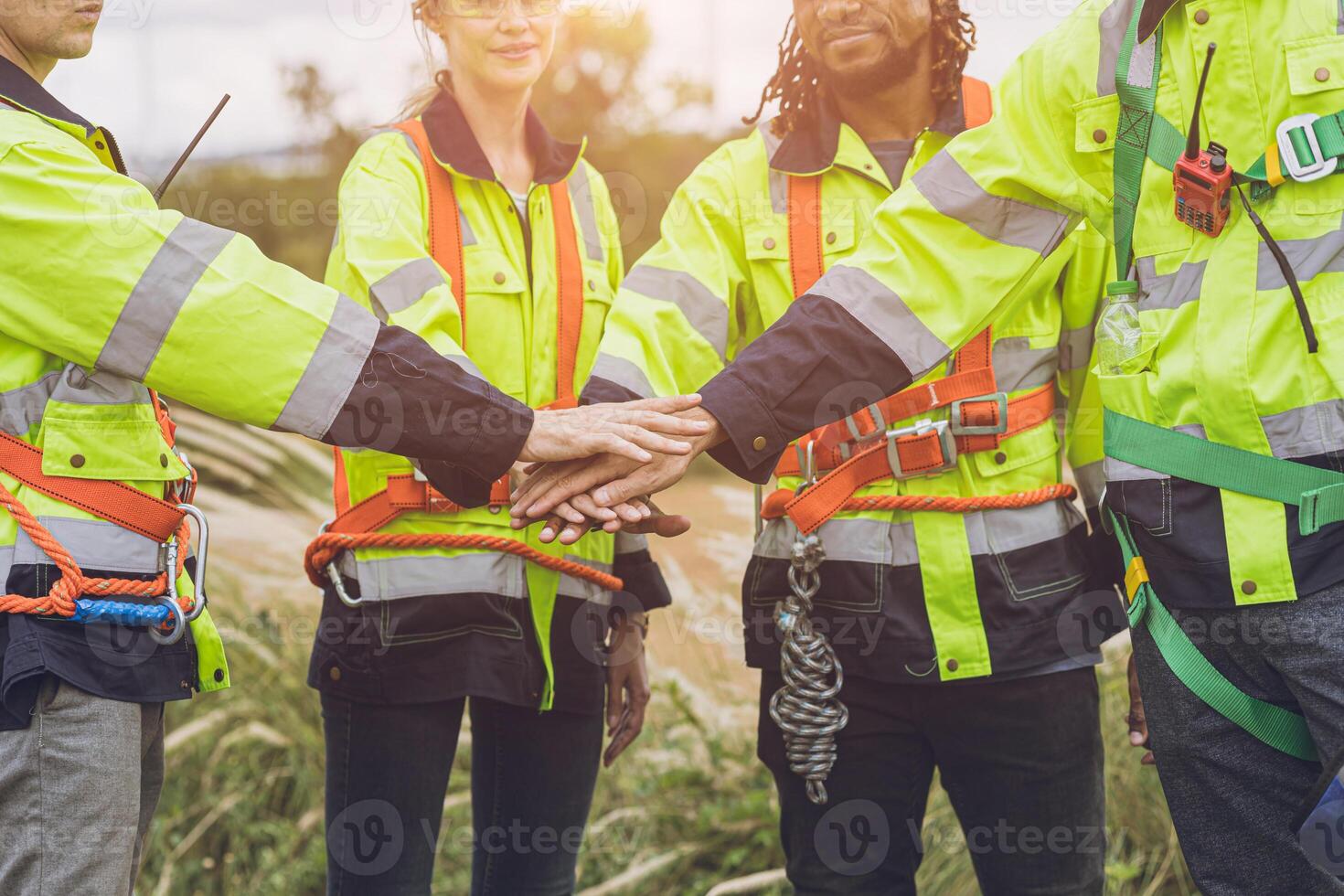 Group of Engineer team workers hand join together working cooperation strong force teamwork powerful concept. photo