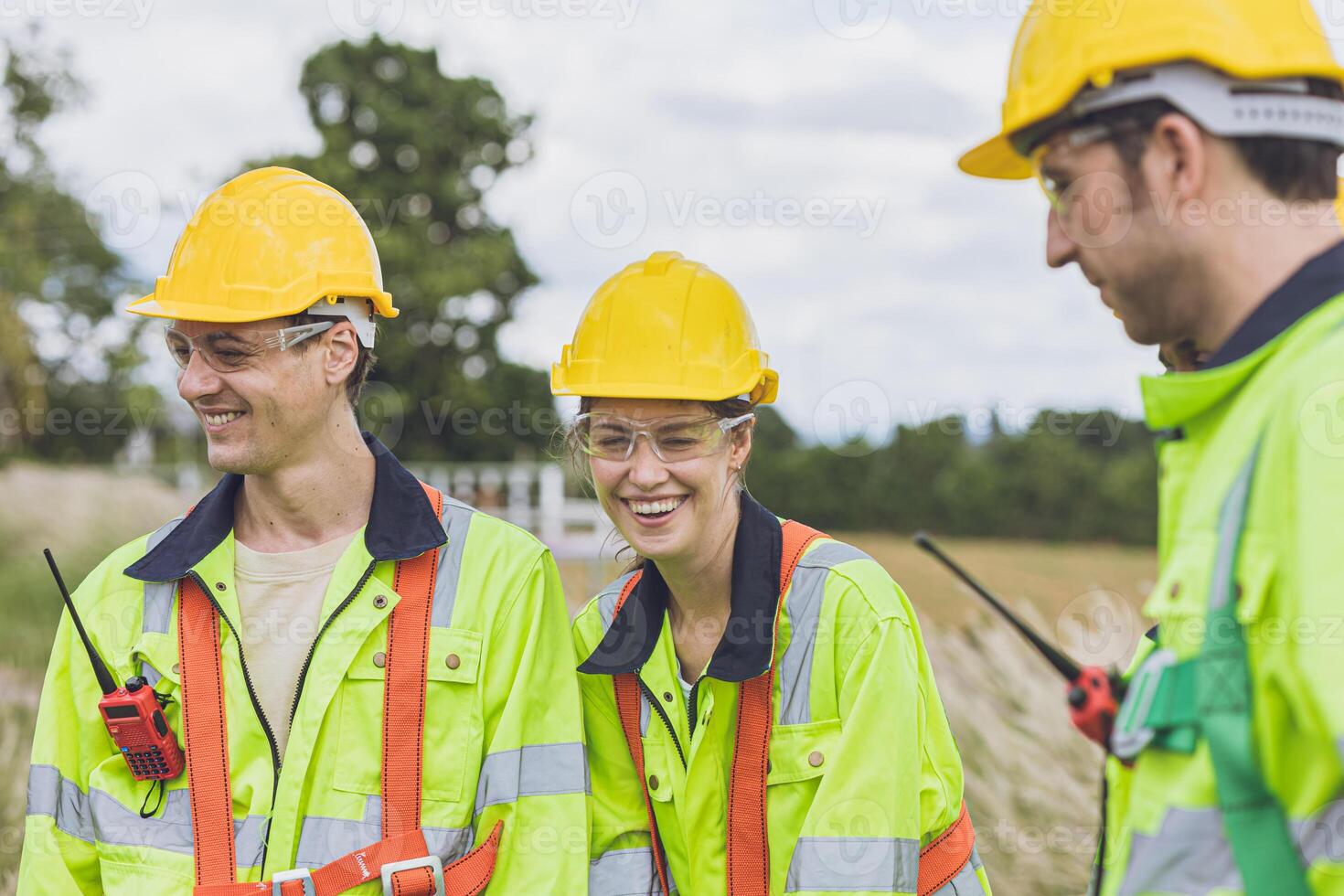Happy smiling and laughing engineer team workers talking together relax at work. photo