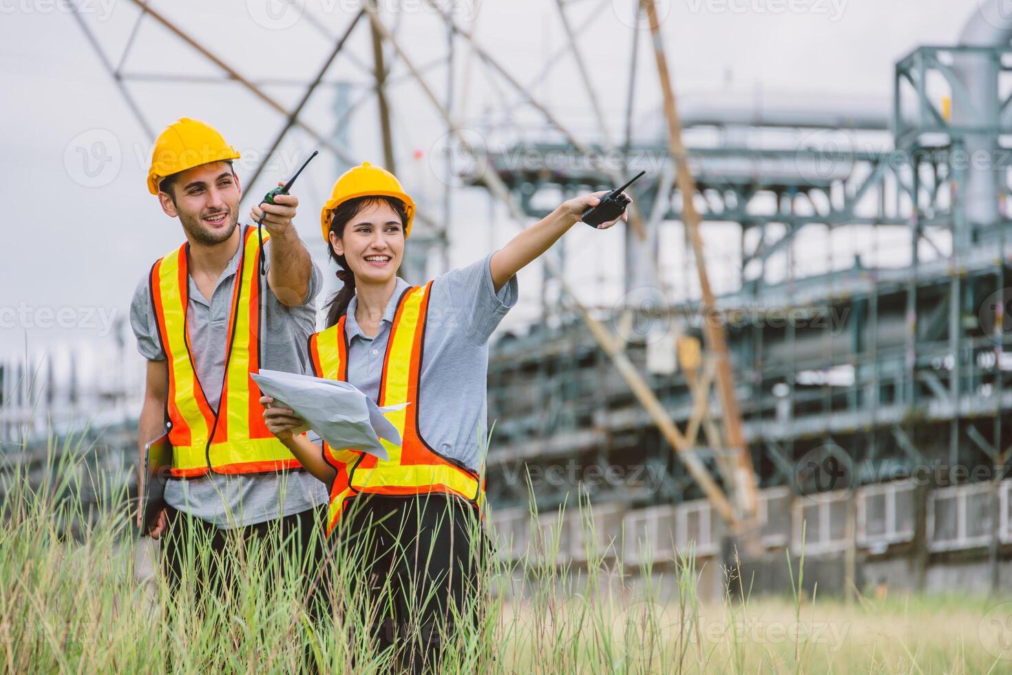 Engineer worker team working outdoor, Surveyor teamwork survey petroleum gas pipe oil transport pipeline and construction building project for refinery industry. photo