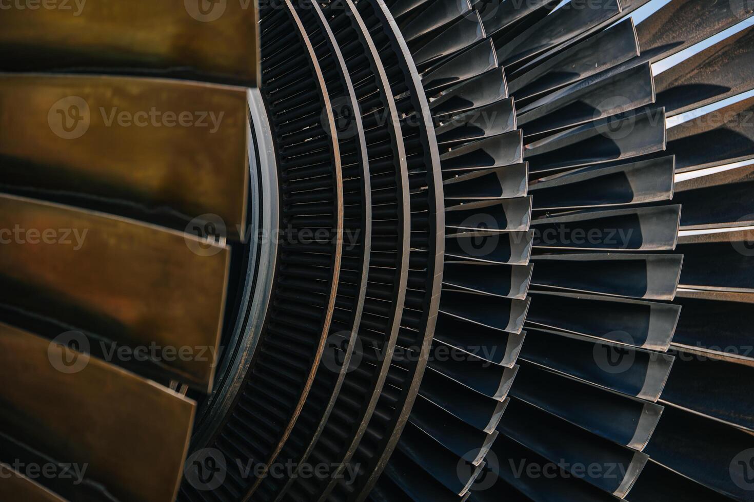 Turbine Blades, High Precision Engineering. Large Fan Stack Layer Metal Part Rotor In Jet Engine Or Steam Power Plant. photo