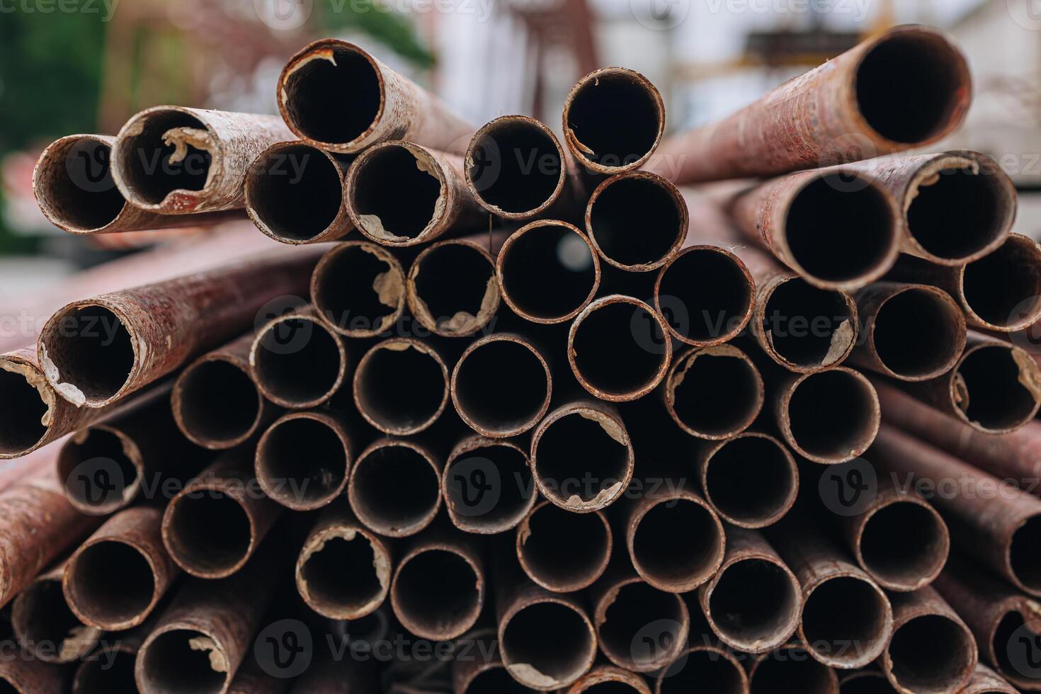 Grunge use round metal pipe anti rust paint used in construction concrete precast form framework photo