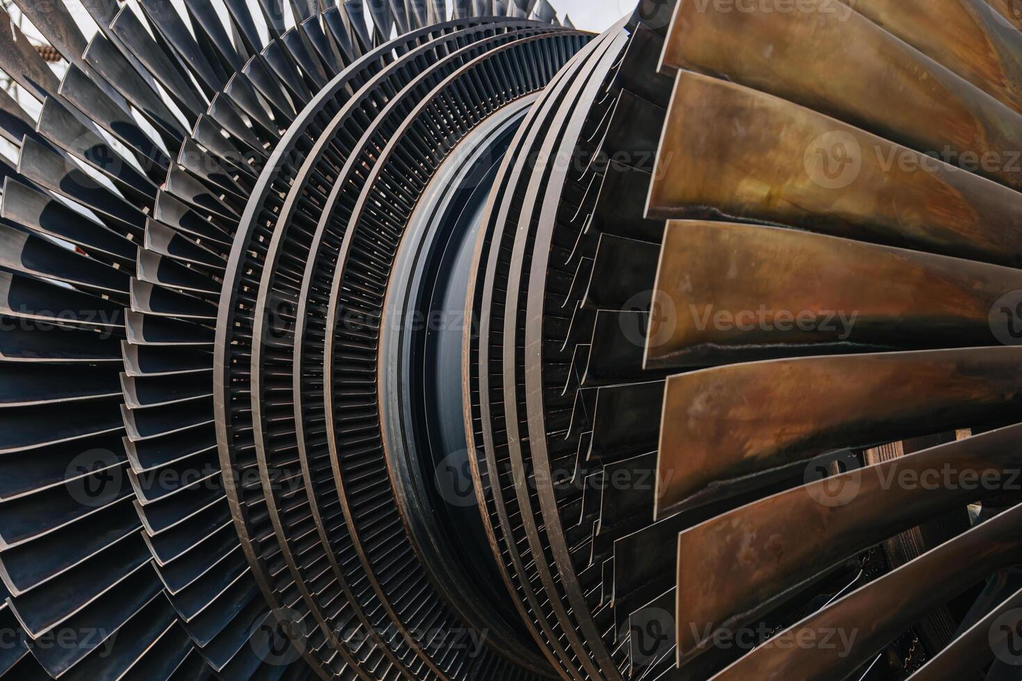 Turbine Blades, High Precision Engineering. Large Fan Stack Layer Metal Part Rotor In Jet Engine Or Steam Power Plant. photo
