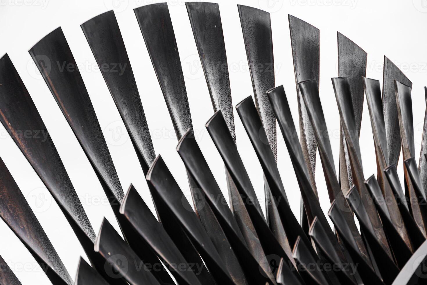 Turbine Blades, High Precision Engineering. Large Fan Stack Layer Metal Part Rotor In Jet Engine Or Steam Power Plant. photo