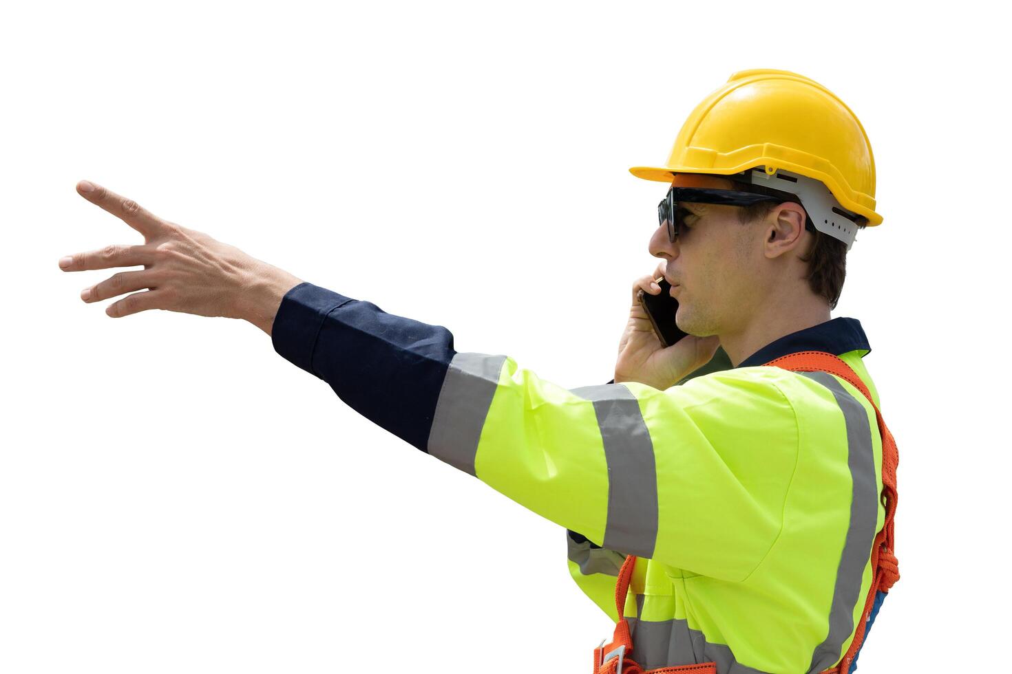 Young Caucasian smart engineer worker male standing hand pointing with phone call dressing safety reflection suit isolated on white background. photo