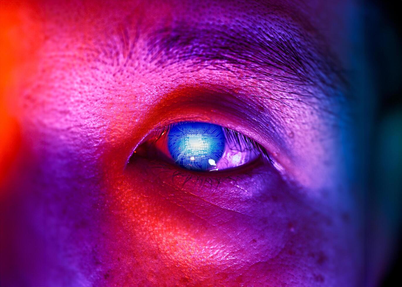closeup chinese man colorful light digital computer circuit board pattern in the eye for future vision people with modern technology photo