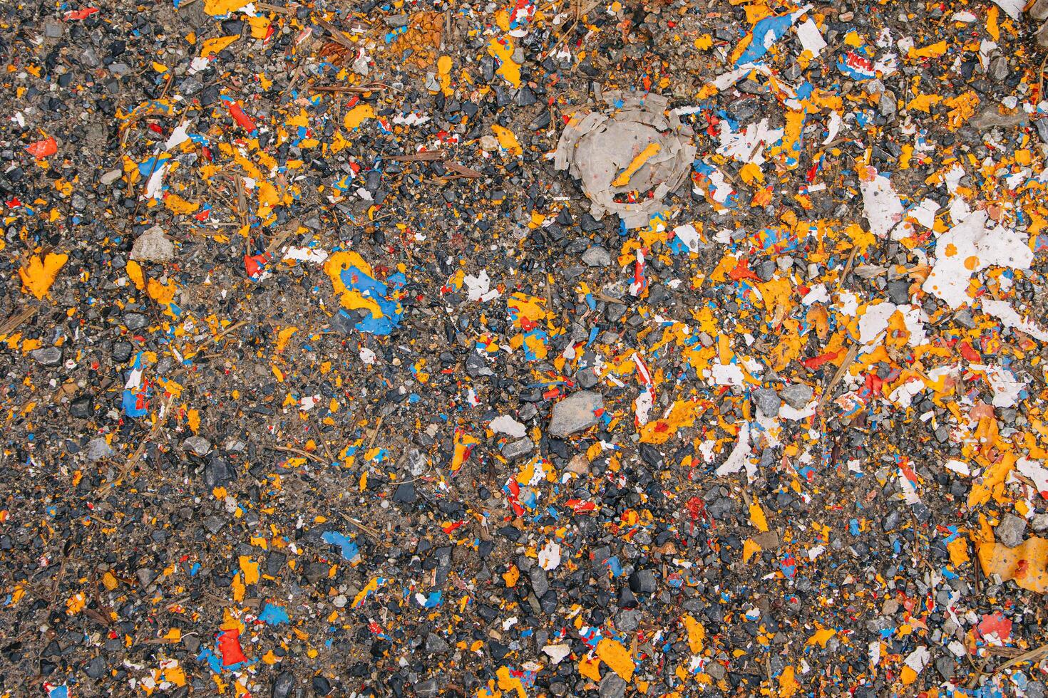 Microplastics lead paint color contaminate on the ground soil environment impact from painting industry. photo