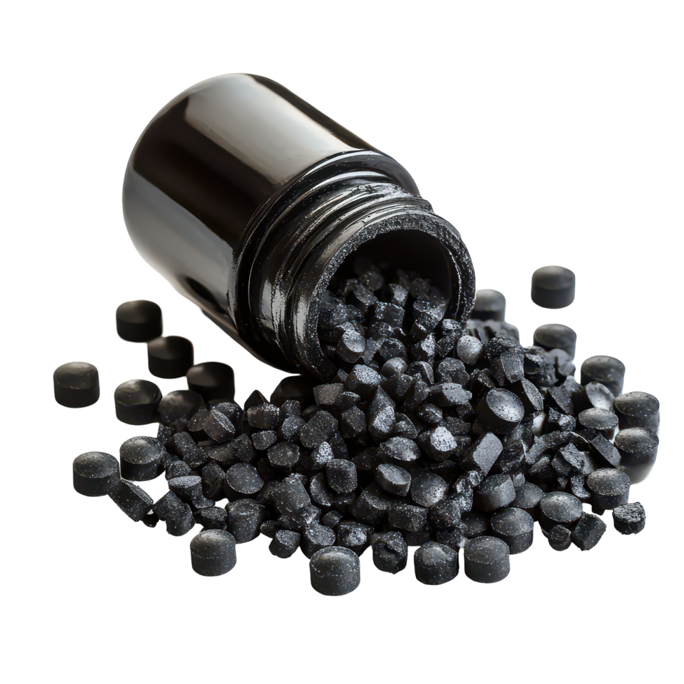 Activated charcoal carbon pills displayed on a transparent background with a bottle and spilled contents, Activated charcoal carbon pillsisolated on transparent background png