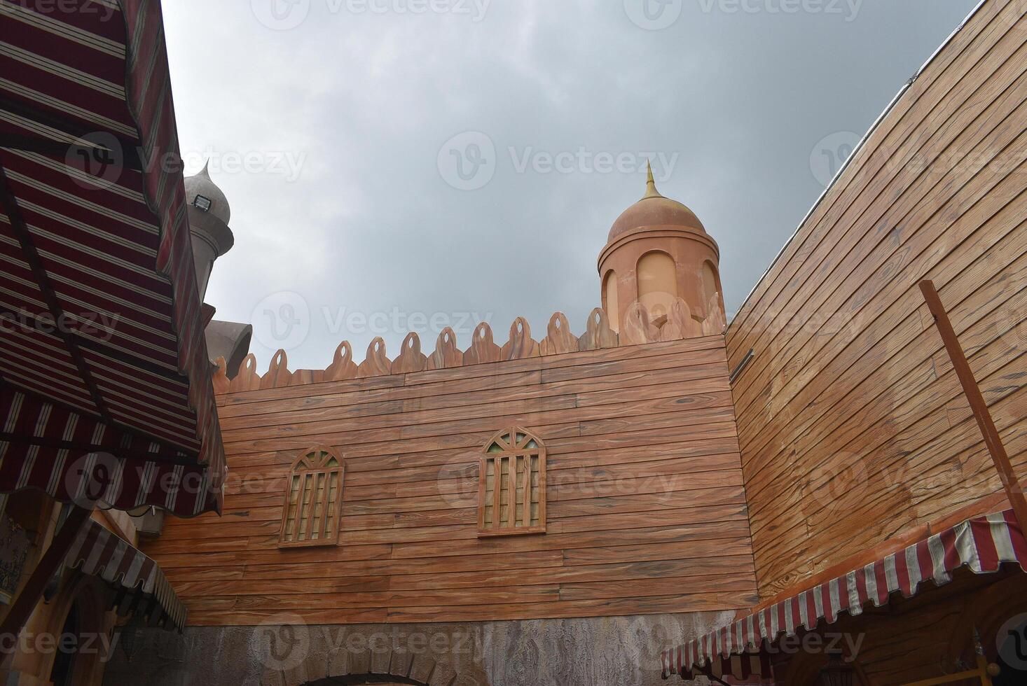 Wooden building with middle eastern theme photo