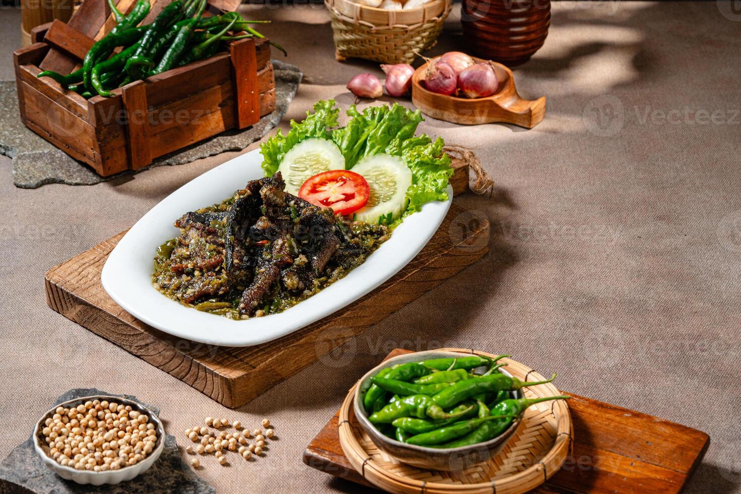 Fried eel with green chili sauce or belut goreng cabe ijo photo