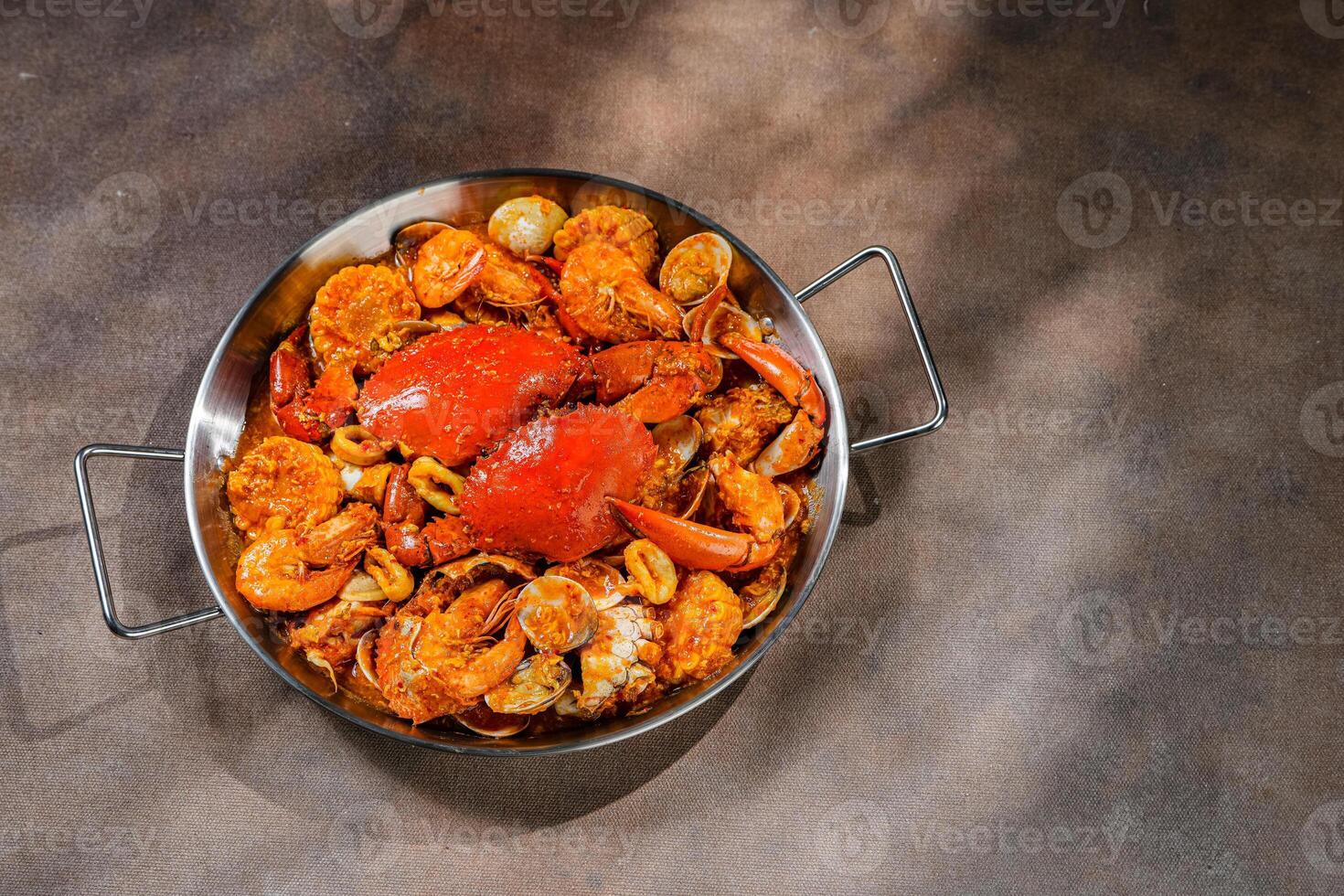 Crab with padang chilli sauce or Kepiting Saus Padang photo