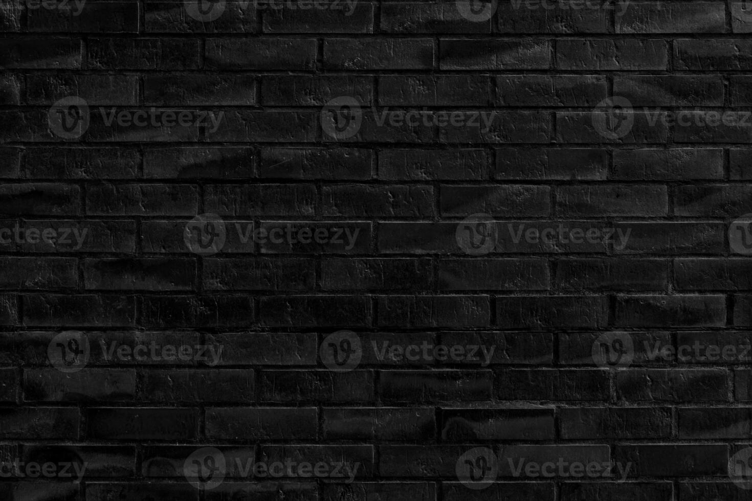The background of the old black brick wall for design interior and various scenes or as a background for interviews. photo