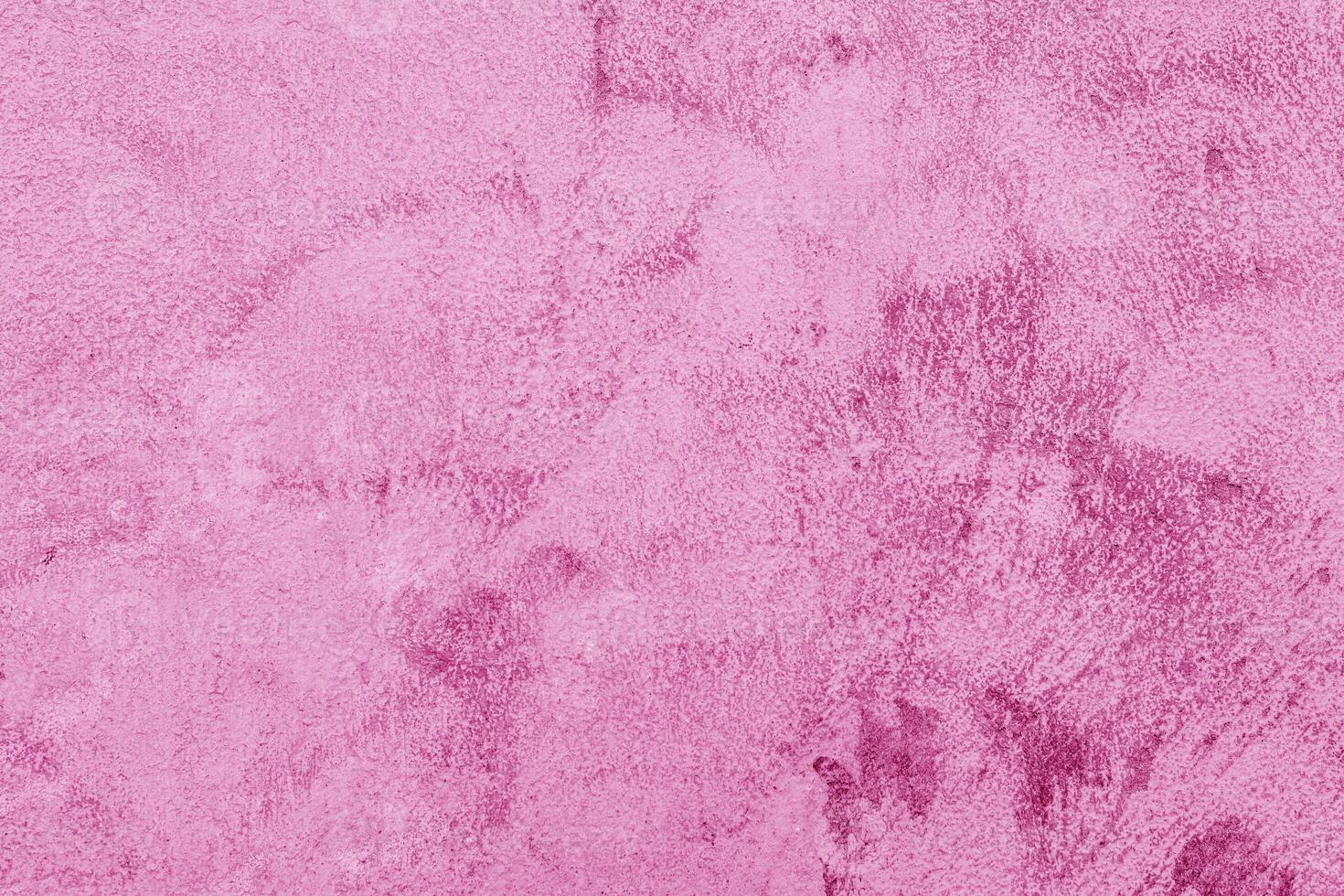 Texture of rough pink plaster. Architectural abstract background. photo