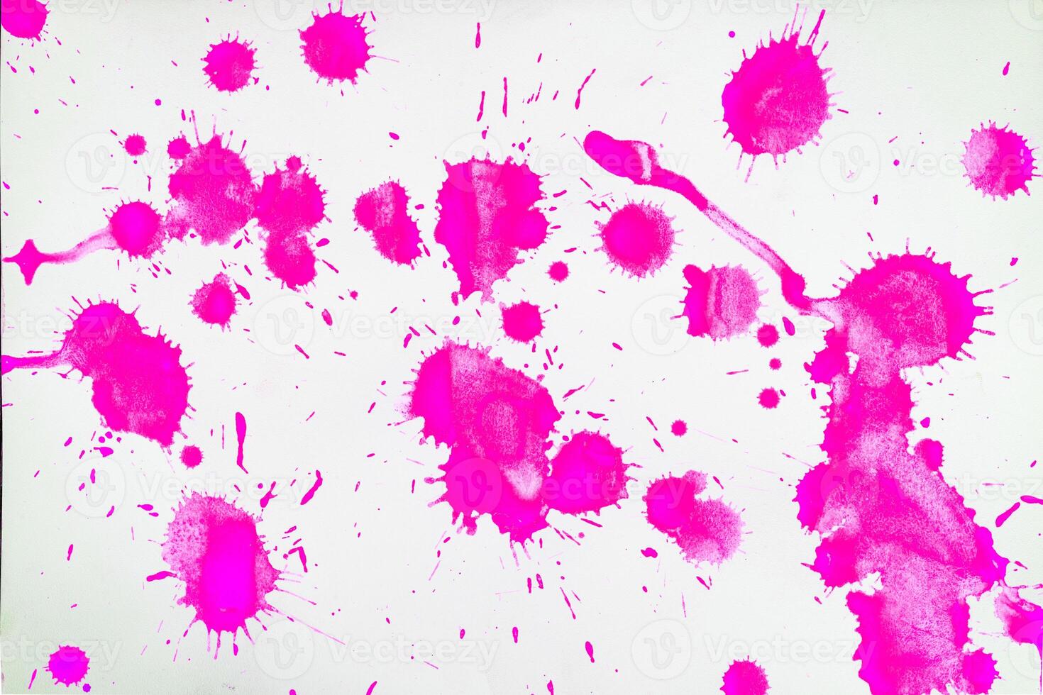 Pink blots and spots on a white background. photo