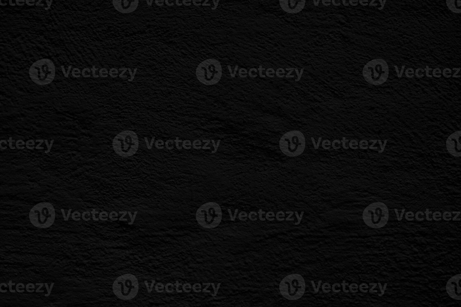 Black stucco texture. Architectural abstract background. Dark wall of building. photo
