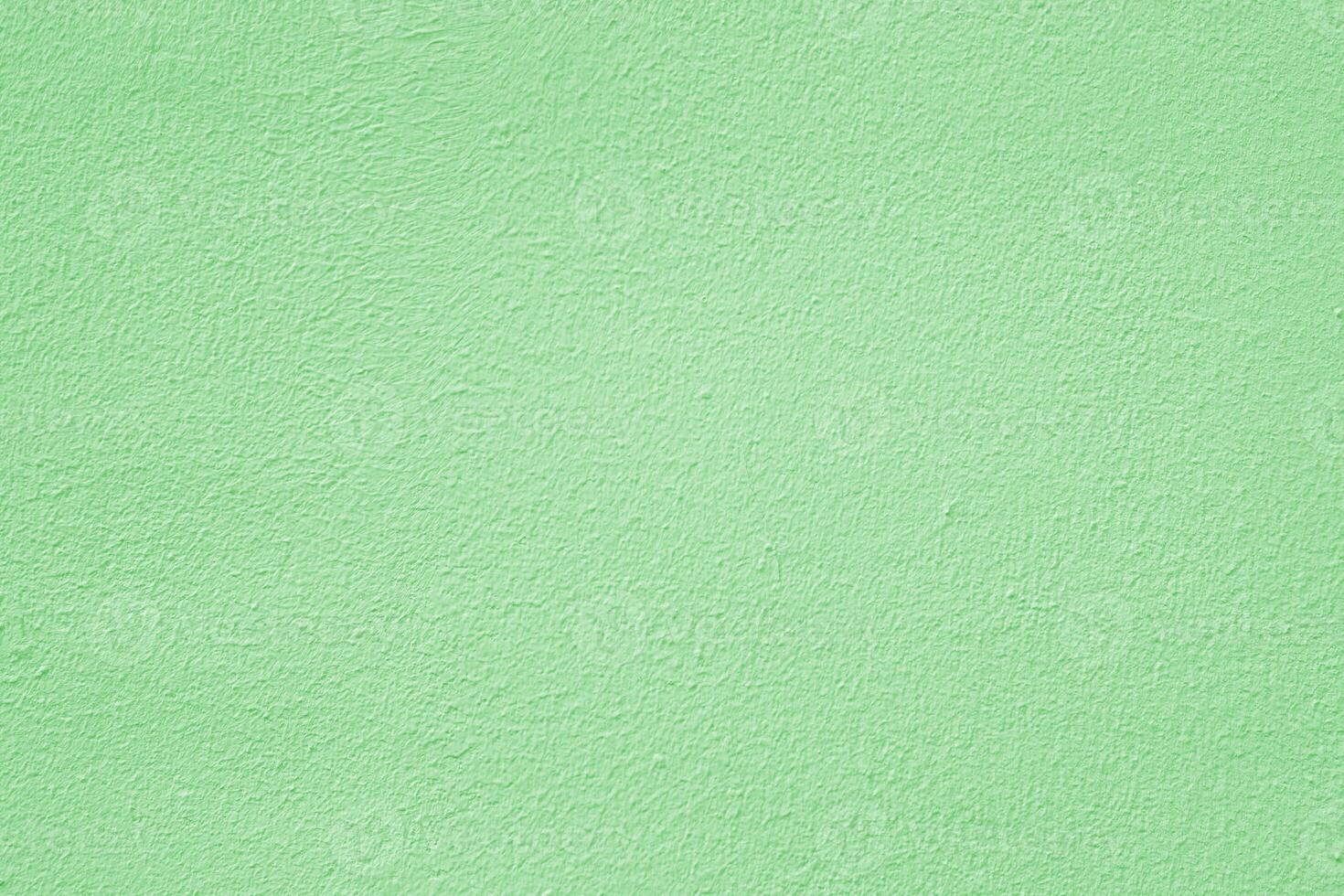 Green stucco texture. Architectural abstract background. Green wall of building. photo