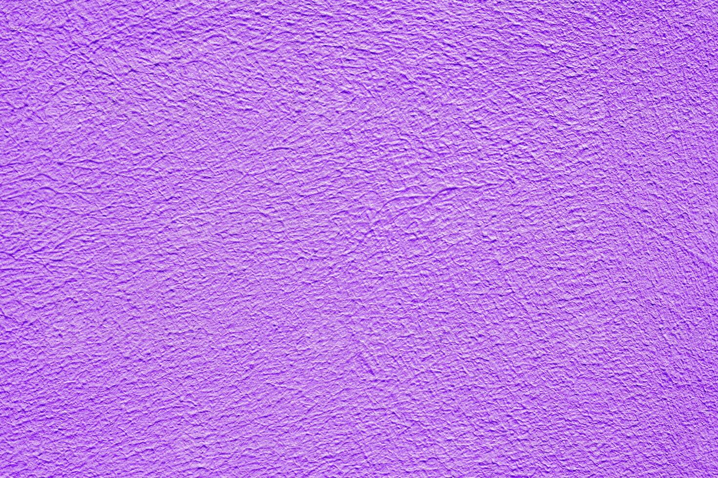 Violet stucco texture. Architectural abstract background. Violet wall of building. photo
