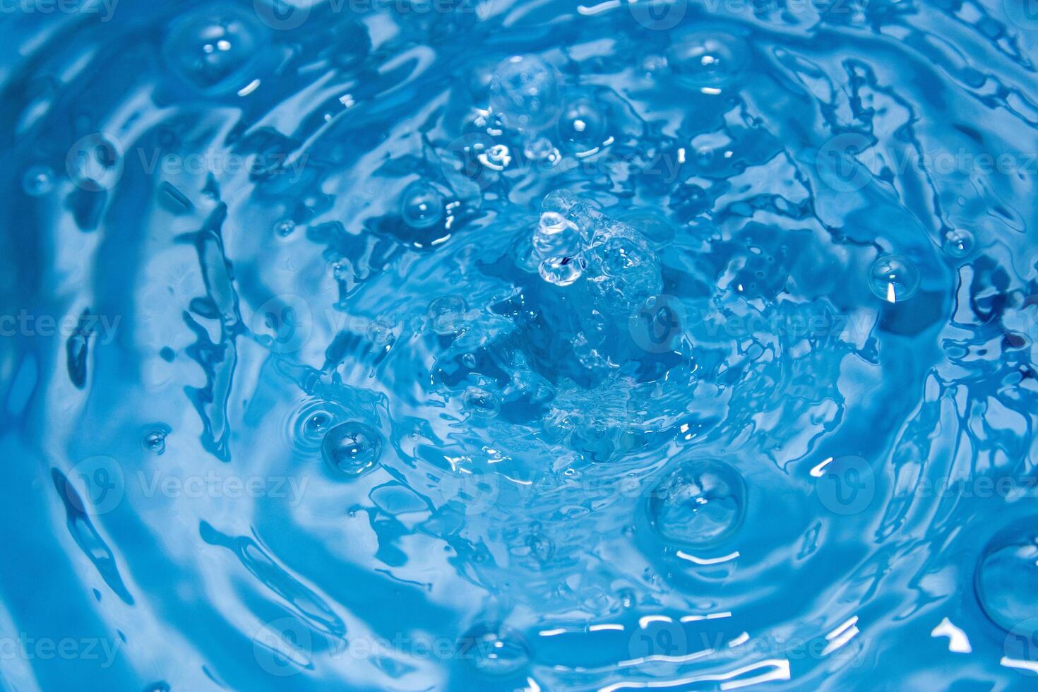 The blue water was so bright and waves from the beautiful waters sparked to a refreshing sensation. photo