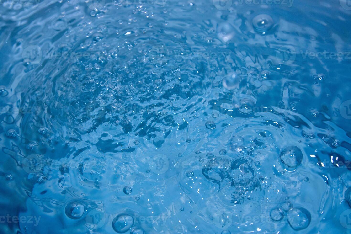 The blue water was so bright and waves from the beautiful waters sparked to a refreshing sensation. photo